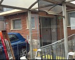 Instalación de láminas solares en un fumadero de empresa en Quart de Poblet